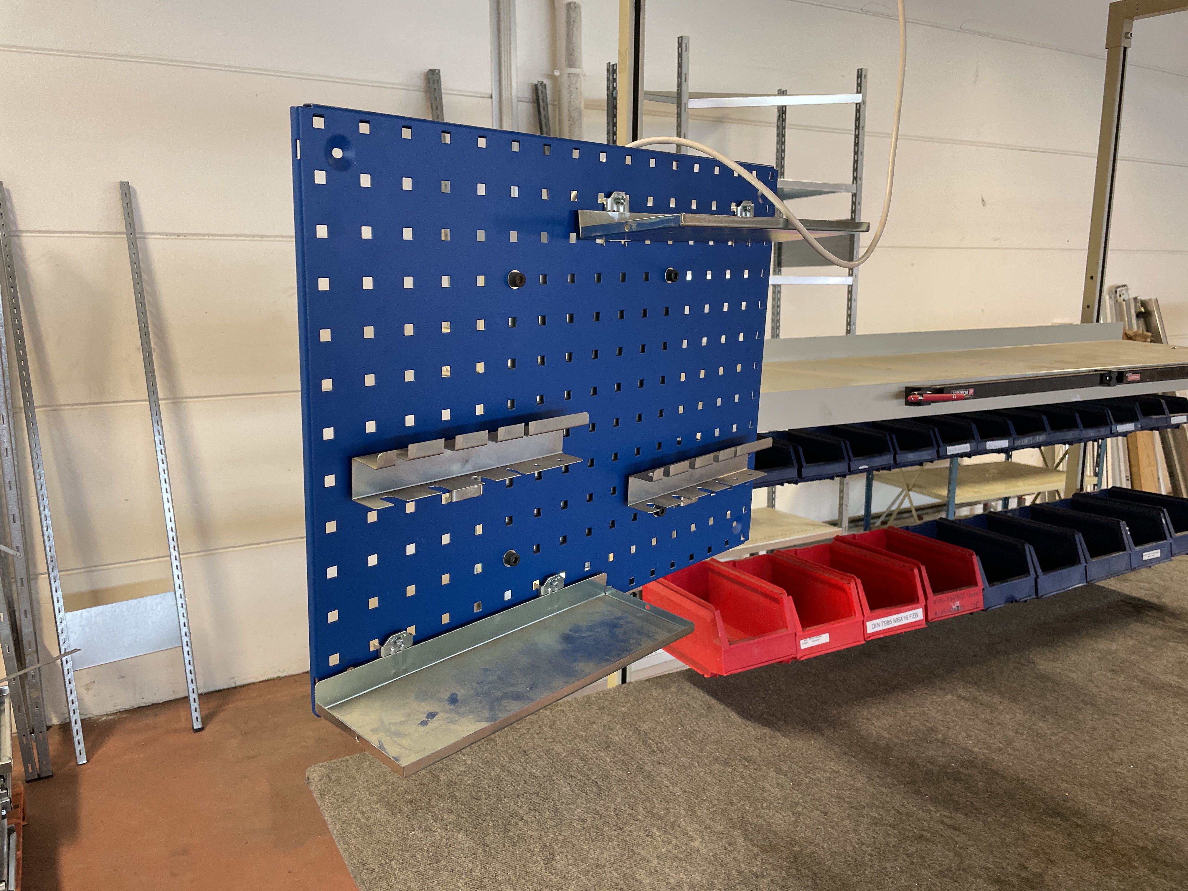 Felt-covered desk with assortment boxes on racks - PS Auction - We ...