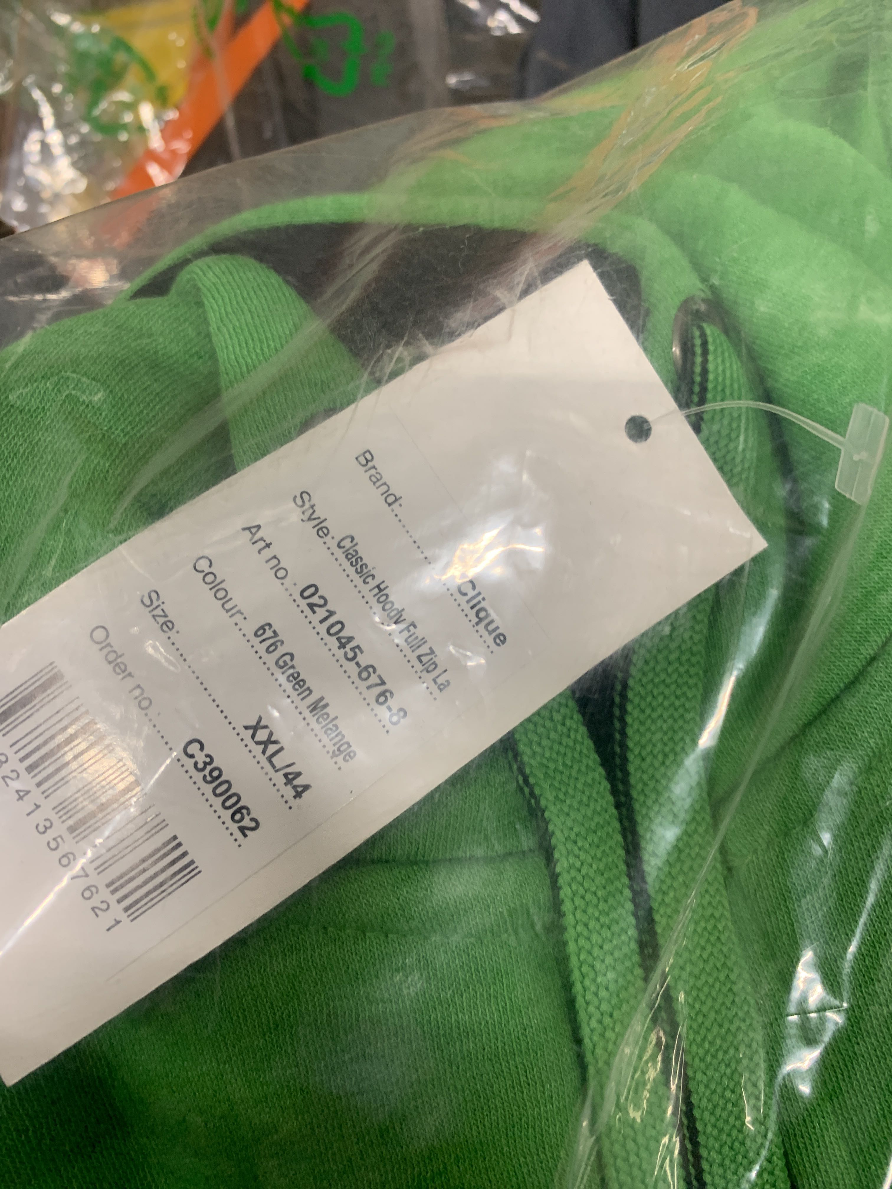 Assortment of various professional clothing trousers, sweaters