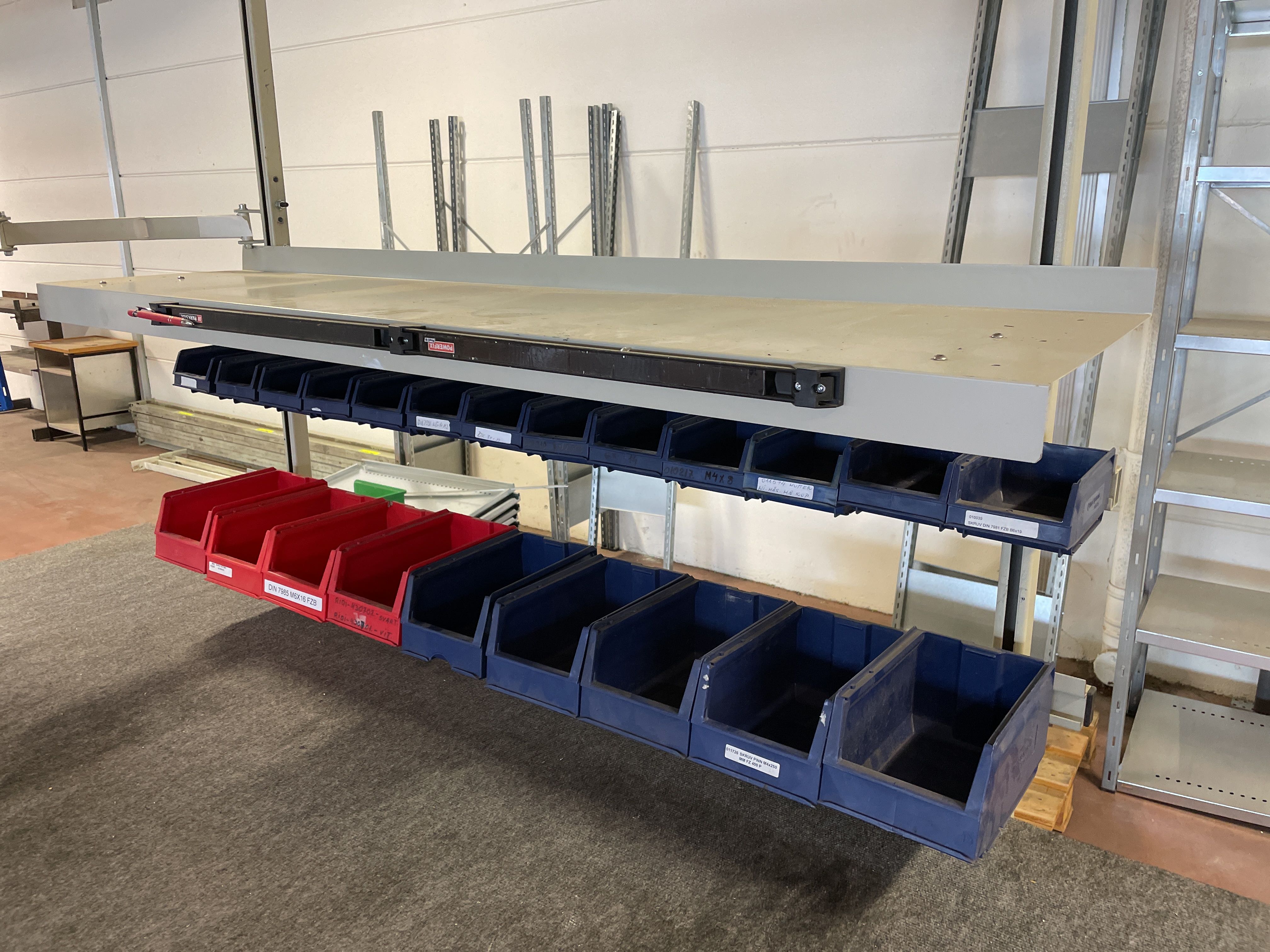 Felt-covered desk with assortment boxes on racks - PS Auction - We ...