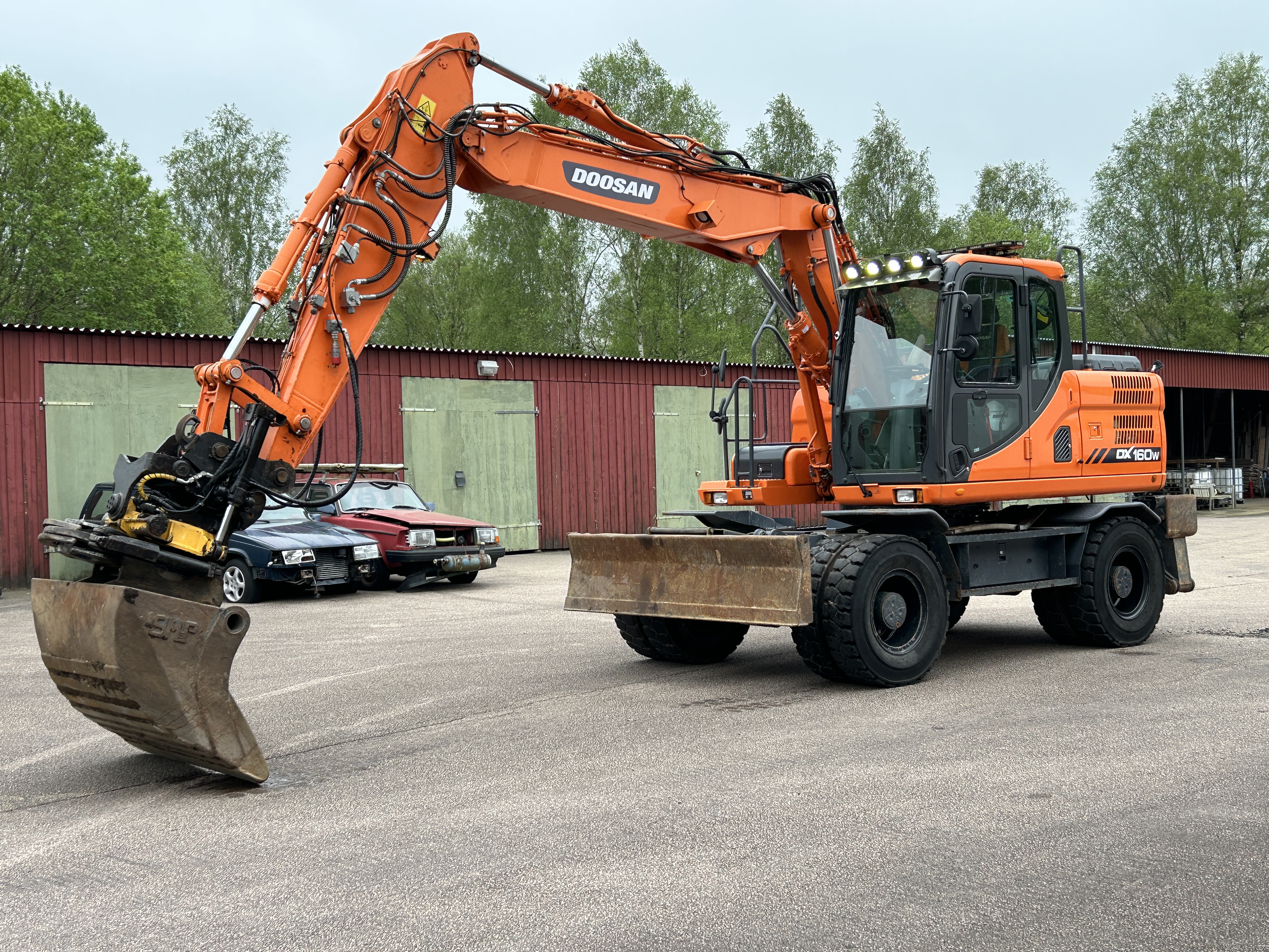Wheeled excavator Doosan DX160W-3 - 2016 | PS Auction
