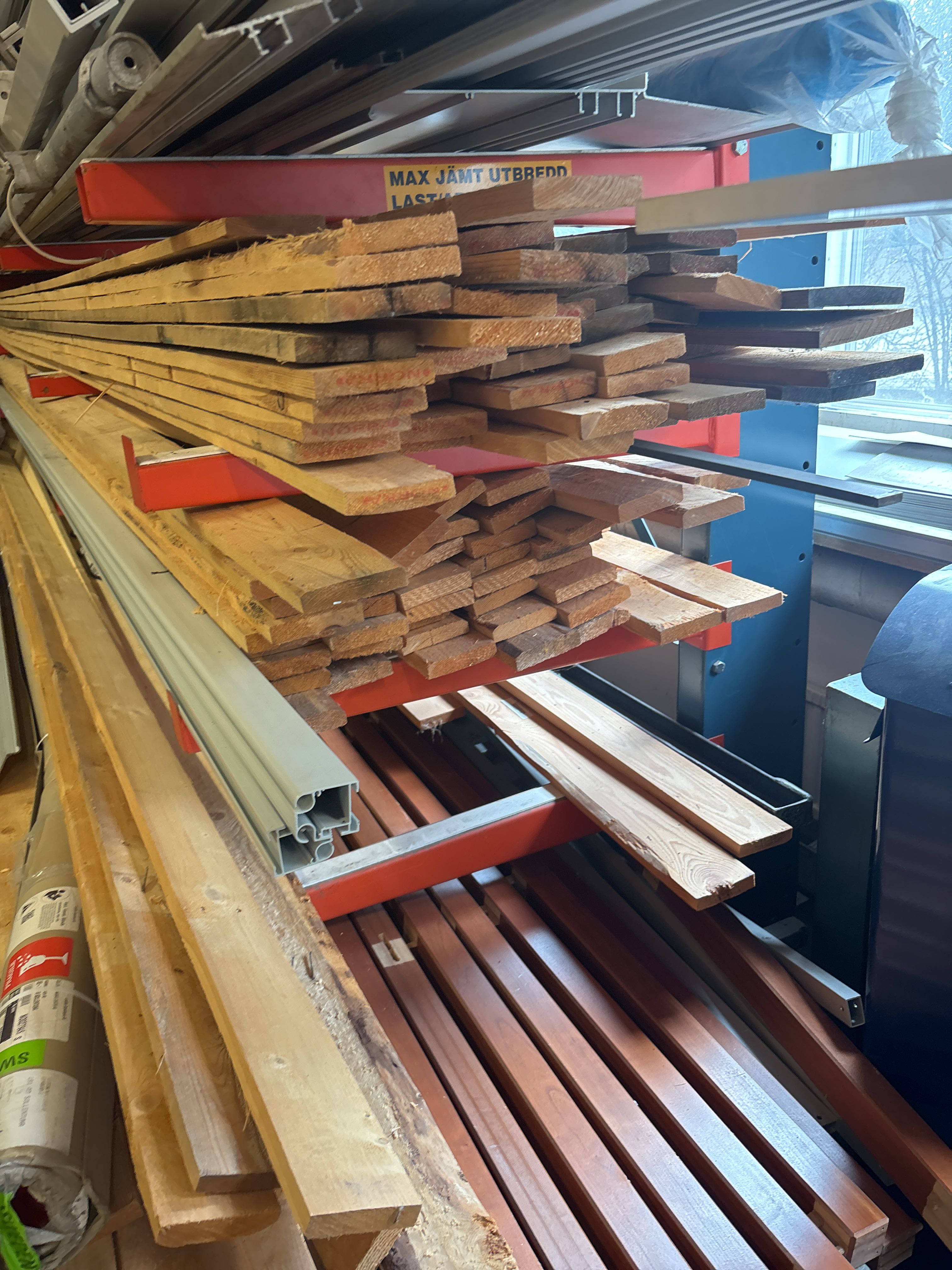 Tiered Part Racks 9-tiered sectional rack with contents - Wood materials, awning parts ...