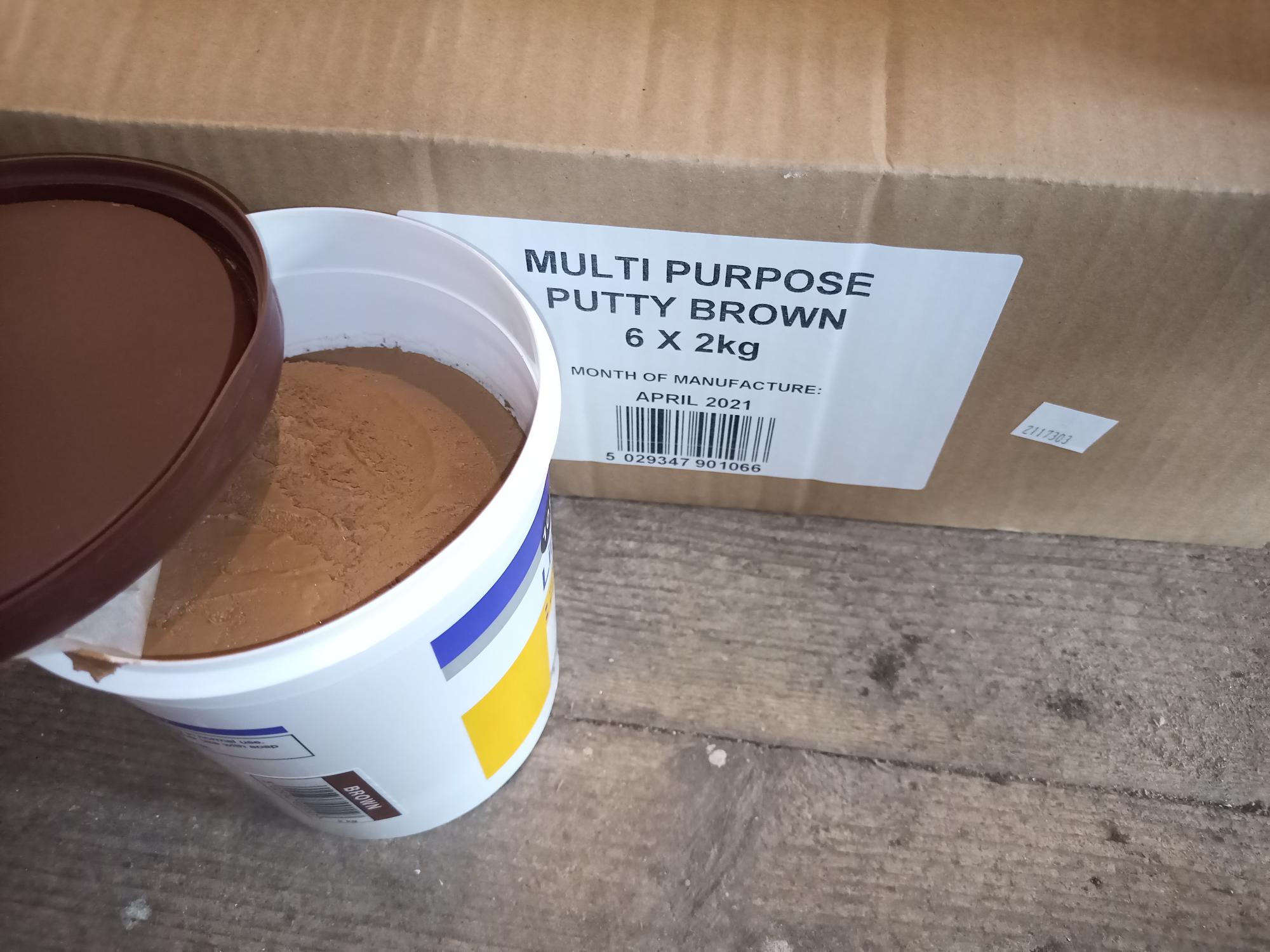 Brown linseed oil putty, 6x2kg cans in a box PS Auction We value