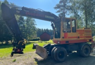 1522951 Wheeled excavator with tiltrotator, attachment and trailer - Åkerman H7Mc -1988