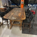 1458335-1 Bar table built from large door with 8 barstools