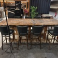 1458335-3 Bar table built from large door with 8 barstools