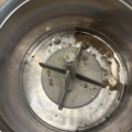 1530251-10 Historic, manually operated washing machine with an associated clothes wringer