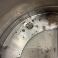 1530251-11 Historic, manually operated washing machine with an associated clothes wringer