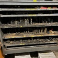 1532762-4 Sheet metal cabinet with drill threading tool