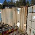 1405814-1 20-fots container med innehåll