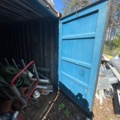 1405814-9 20-fots container med innehåll