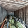 1405814-10 20-fots container med innehåll