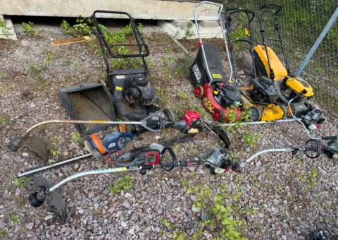 Various lawn mowers, trimmers and hedge trimmers