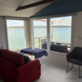 1491548-8 Nyrenoverad husbåt med vedeldad bastu - "Muskö Sealodge"