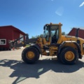 1529714-4 Wheel loader with quick hitch - Volvo L60G - 2014