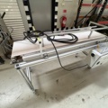 1471465-2 Conveyor belt with guide rails and electrical cabinet