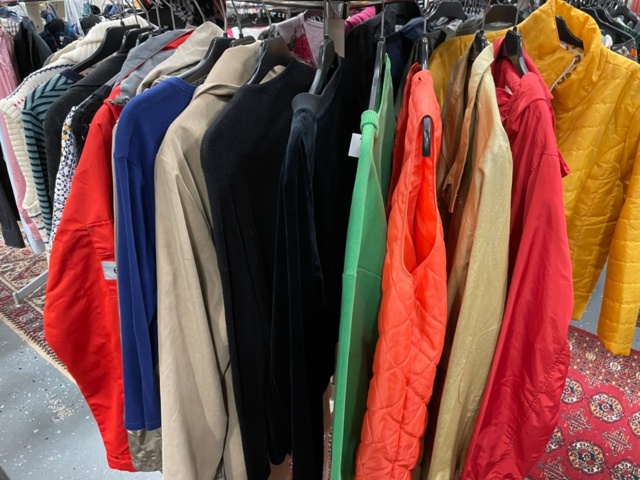 1536902-2 Clothes on rack including rack