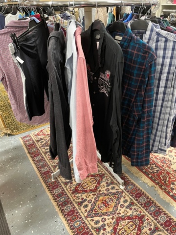 1536903-1 Clothes on clothes rack including stand