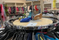 1536904 Clothes on clothes rack including stand