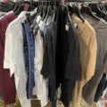 1536904-3 Clothes on clothes rack including stand