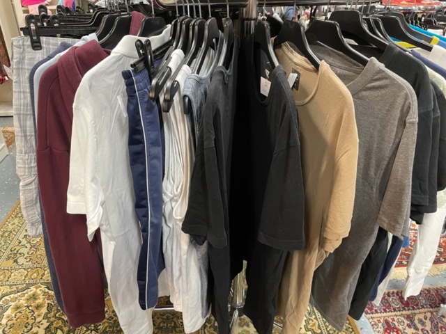 1536904-3 Clothes on clothes rack including stand