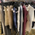 1536904-4 Clothes on clothes rack including stand