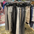 1536904-5 Clothes on clothes rack including stand
