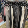 1536904-6 Clothes on clothes rack including stand