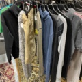 1536904-7 Clothes on clothes rack including stand