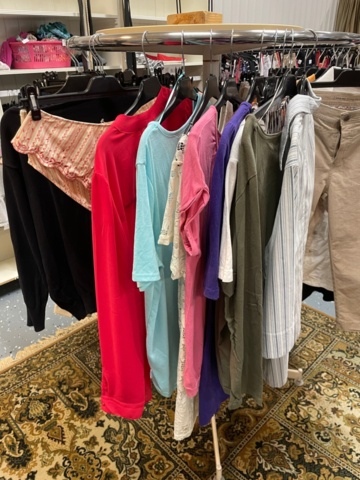 1536905-2 Clothes on clothes rack including stand