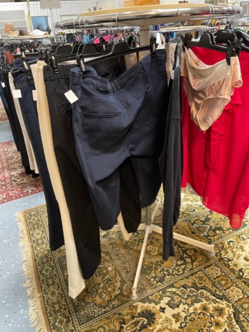 1536905-3 Clothes on clothes rack including stand