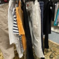 1536905-6 Clothes on clothes rack including stand
