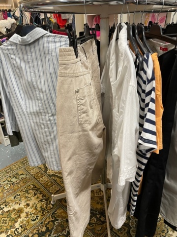 1536905-7 Clothes on clothes rack including stand