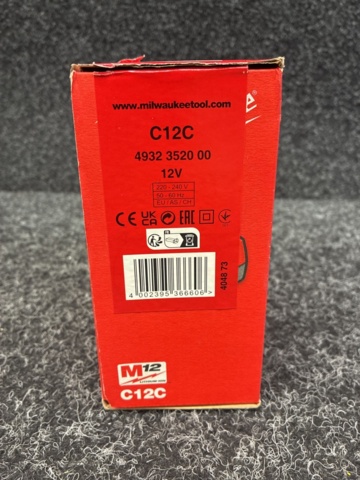 1540325-4 Laddare Milwaukee C12C
