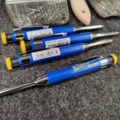 1540312-3 Penslar, slippapper, rollerbyglar m.m.