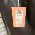 1447169-21 Parti med Dam / Herrkläder från klädbutik