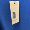 1447169-26 Parti med Dam / Herrkläder från klädbutik
