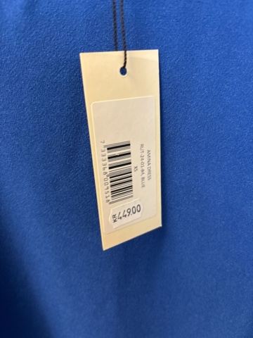 1447169-26 Parti med Dam / Herrkläder från klädbutik