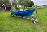 1475290 Motorbåt med trailer och utombordsmotor - Evinrude 9.9