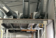 1504284 Fjärrvärmeanläggning med ventilations- och filtersystem för odlingstält
