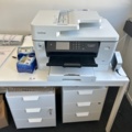 1531926-1 Table with printers, laminators and filing cabinets