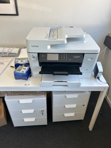 1531926-1 Table with printers, laminators and filing cabinets