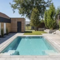 1464196-1 Keramisk overflowpool från Compass Pools  med vantagessystem