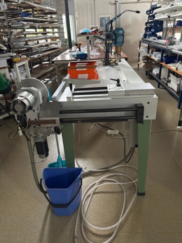 1546040-3 Pleating machine fabric cutting with heat and hole drilling in fabric