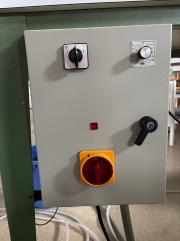 1546040-8 Pleating machine fabric cutting with heat and hole drilling in fabric