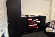 1546073 Bookshelves, furniture and printers
