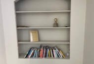 1557459 Books and lamp on bookshelf