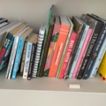1557459-3 Books and lamp on bookshelf