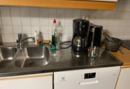 1557465 Innehåll i köksskåp