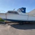 1516217-2 Motorbåt med båtvagn och motor - Coronet 24