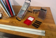 1141003 Good things for the kitchen, cutting boards with racks, mandolin etc.